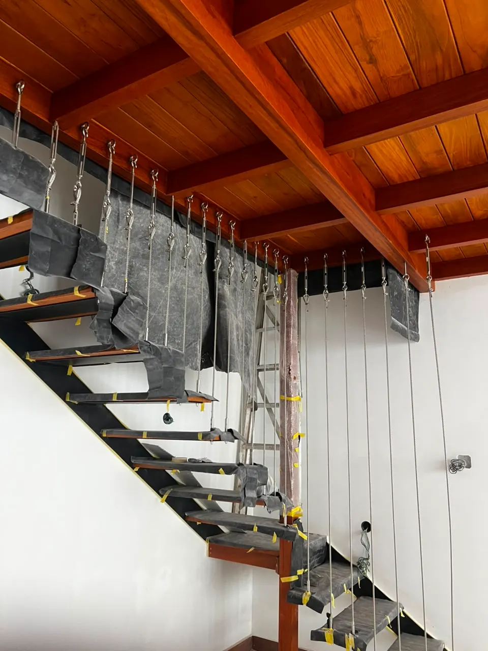 Rosmead Place under construction: the staircase and ceiling, the stair treads still wrapped