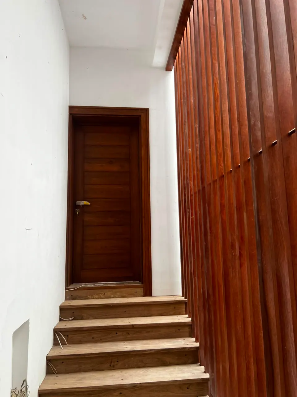 Rosmead Place under construction: a stair rising to a door
