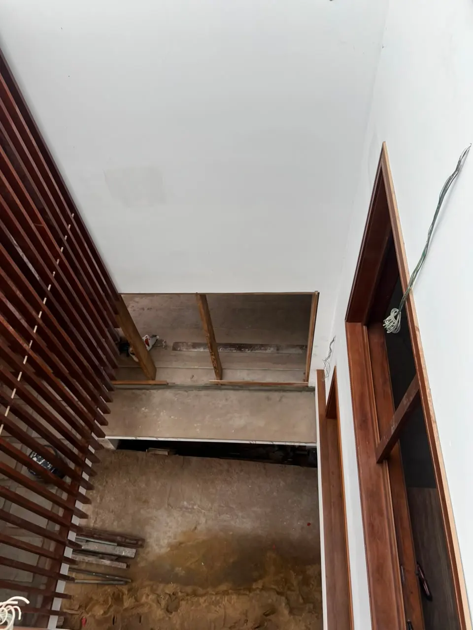 Rosmead Place under construction: an unfinished opening beside the stair